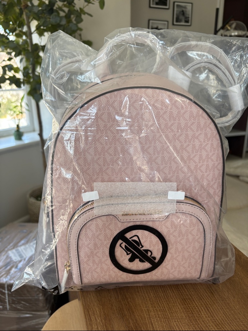 Michael Kors Blush Pink Mini Backpack with Signature Logo